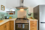 Cooker range with wide oven